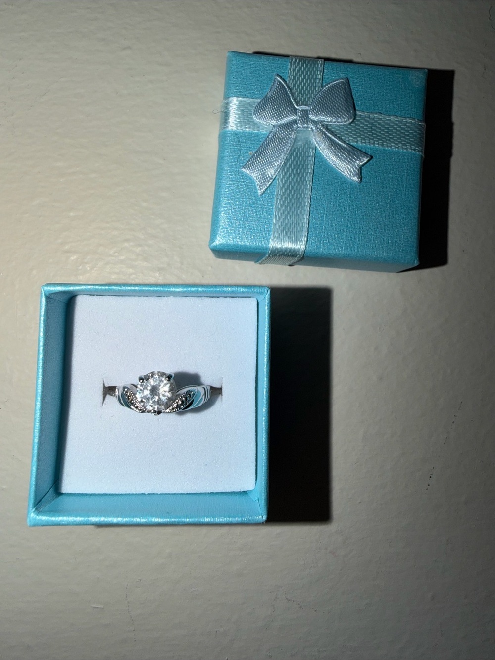Silver Solitaire CZ Engagement Ring with Accent Stones - White
